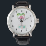 Pink Flamingo Palmen und Sukkulturen Armbanduhr<br><div class="desc">Eine Uhr mit einer Illustration eines rosa Flamingos mit grünen Palmen dahinter und einem dekorativen Blumenstrauß unten. Tropisch und hübsch.</div>