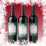 Pink Floral and Green Christmas Wine Label Weinetikett<br><div class="desc">This Christmas wine label is ready to be personalized with your own text. Printed with a cluster of pink florals accented with sprigs of pine and berries on a dark sage green background. Edit all text as desired.</div>