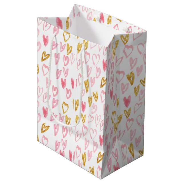 Pink & Gold Herz-Geschenktasche Mittlere Geschenktüte (Vorderseite Schrägansicht)