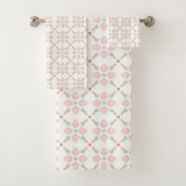Pink petal and pastel triangle tile pattern on whi badhandtuch set