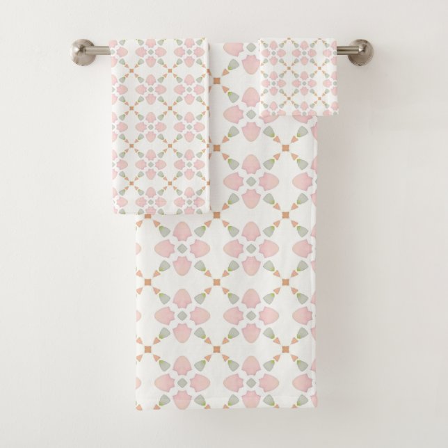Pink petal and pastel triangle tile pattern on whi badhandtuch set (Insitu)