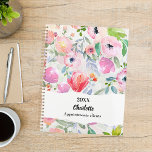 Pink purple watercolored flowers 2026 planer<br><div class="desc">Watercolored flowers in blush pink and purple. A soft blush pink background, decorated with a large bow.</div>