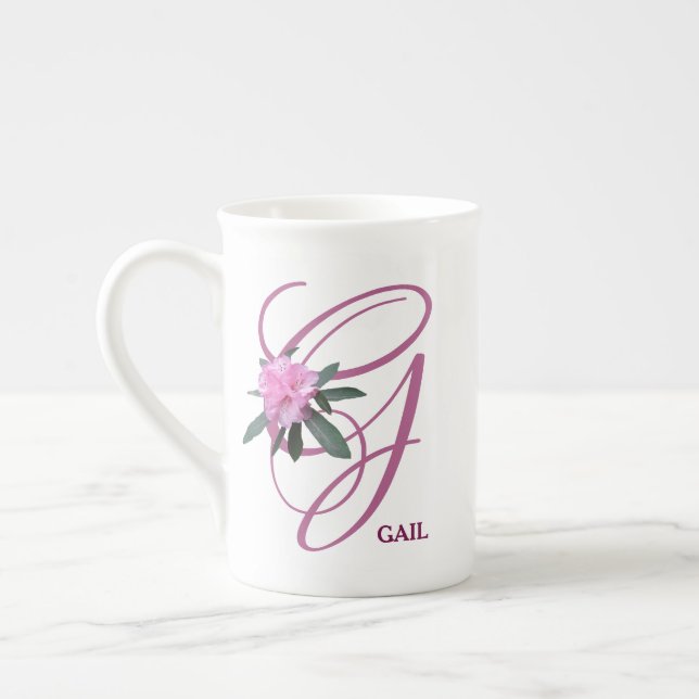 Pinkfarbene Blume für den Gail-Namen in Monogramm Prozellantasse (Links)