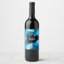 Pinselstriche in blauen Farbtönen mit Monogramm