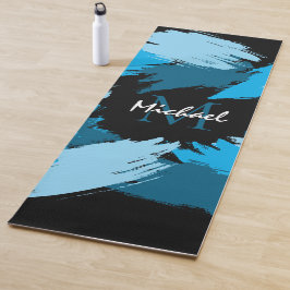 Pinselstriche in blauen Farbtönen mit Monogramm Yogamatte