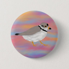 Pipe Plover auf einem Sonnenuntergang Button