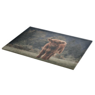 Planche À Découper Campagne d'herbe d'automne de la vache de haute-te