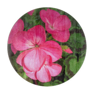 Planche À Découper Fleur De Géranium Rose Avec Boucles D'Eau Photo
