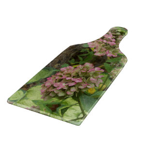 Planche À Découper Hydrangea d'automne en fleurs avec feuilles d'host
