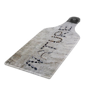 Planche À Découper La nature dans le sable