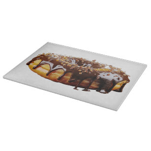 Planche À Découper Le beignet décadent de SlipperyJoe's recouvert d'u
