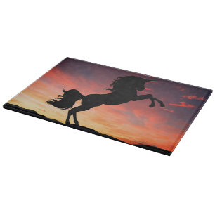 Planche À Découper L'élevage de licorne dans un magnifique coucher de
