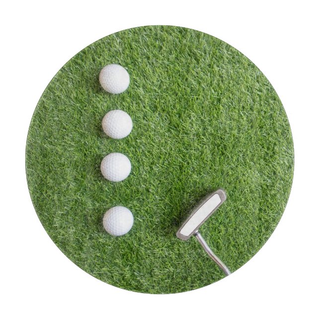 Planche À Découper Les balles de golf sont sur l'herbe verte (Devant)