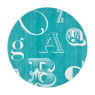 Planche À Découper Lettres décoratives sur l'arrière - plan bleu