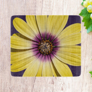 Planche À Découper Marguerite africaine jaune sur fond floral noir
