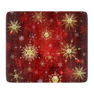 Planche À Découper Noël Golden Snowflakes sur Arrière - plan rouge