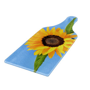 Planche À Découper Tournesol contre soleil sur ciel bleu - été