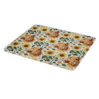 Vaches Highland et fleurs de tournesol jaune