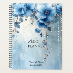 Planer mit blauen Blumen und Perlen