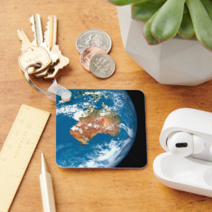 Planet Erde mit Wolken über Australien. Schlüsselanhänger