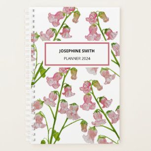 Planificateur de fleurs roses à l'aquarelle