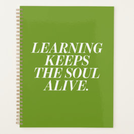 Planner with a motivational text planer