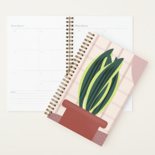 Plantes serpent sur fond rose carreau rose