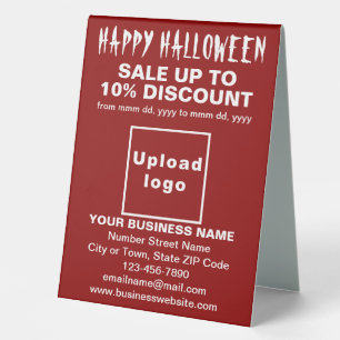 Plaque De Table Vente d'Halloween d'affaires sur la table rouge