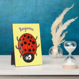 Plaque Photo Caricature de coccinelle rouge joyeux