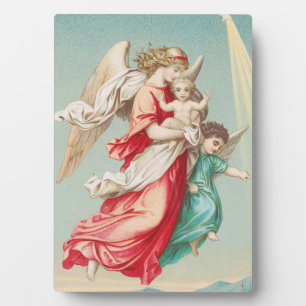 Plaque Photo Deux anges portent un petit enfant