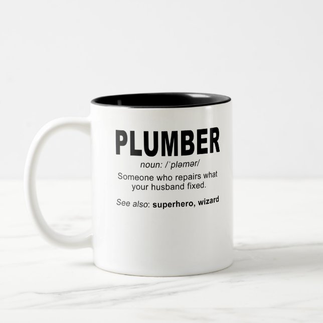 Plumbername: /piela mugr/ Jemand, der das reparier Zweifarbige Tasse (Links)