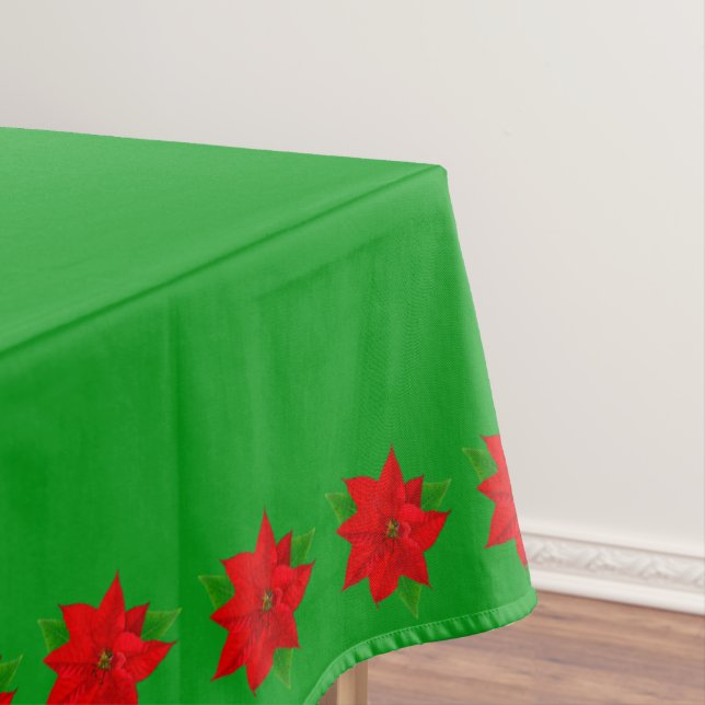 Poinsettia-Blume auf Grün Tischdecke (Beispiel)