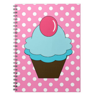 Points roses de KRW et carnet bleu de petit gâteau