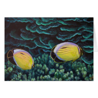 poissons exquis de papillon dans le corail
