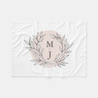 Couverture décorée d'un monogramme de guirlande