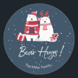 Polar Bear Hugs Christmas ID851 Runder Aufkleber<br><div class="desc">Dieser skurrile Weihnachtsaufkleber weist einen tiefblauen Hintergrund auf,  überzogen mit roten und weißen Eisbärenfiguren und typografischer Textgestaltung von "Bärenhugs". Eine Vorlage erlaubt es Ihnen,  Ihren Namen oder anderen Text einfach hinzuzufügen. Suchen Sie ID851 um alle für dieses Design koordinierenden Produkte zu sehen.</div>