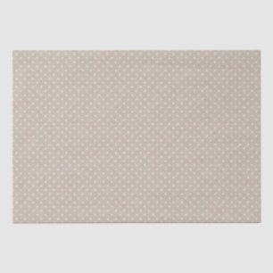 Polka dotiert auf einem texturierten Beige Seidenpapier