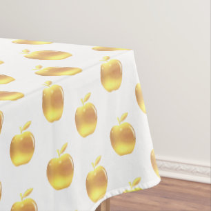 Pommes d'or sur nappes blanches