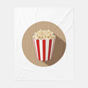 Popcorn im Hintergrund eines braunen Kreises Fleecedecke