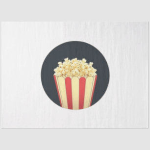 Popcorn in einer rot-weiß gestreiften Tube Seidenpapier