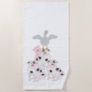 Porcs et serviette de plage d'Oie