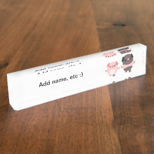 Porcs mignons de bande dessinée sur une plaque