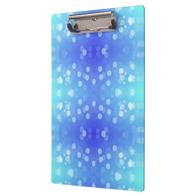 Porte-bloc clipboard featuring a blue and teal bokeh pattern  (Gauche)