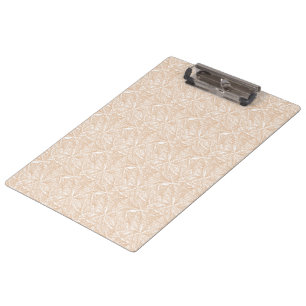Porte-bloc Un tapis marron avec un motif complexe se trouve s