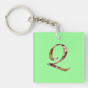 Porte-clés à motif floral Q Monogramme