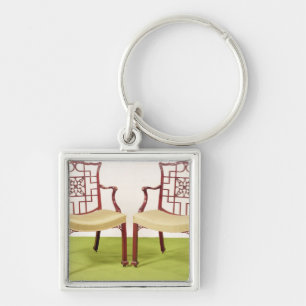 Porte-clés Acajou de Chippendale dinant des chaises