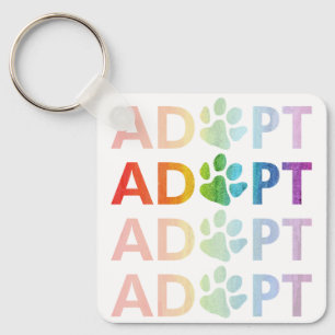 Porte-clés Adopter le texte empilé Paw Arc-en-ciel