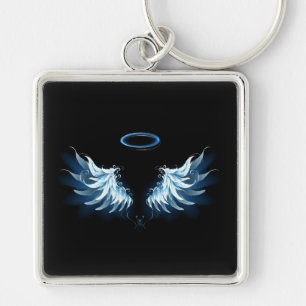 Porte-clés Ailes d'ange lumineuses bleues sur fond noir