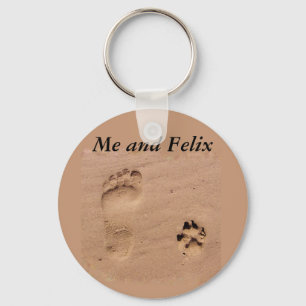 Porte-clés Animal familier et empreinte de pas dans le sable