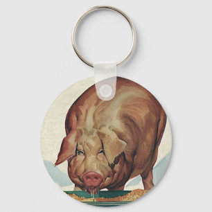 Porte-clés Animaux de ferme vintages, Cochon mangeant à un tr